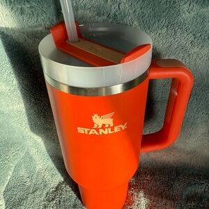 Stanley Orange Travel Mug with Insulated Design and Comfortable Handle